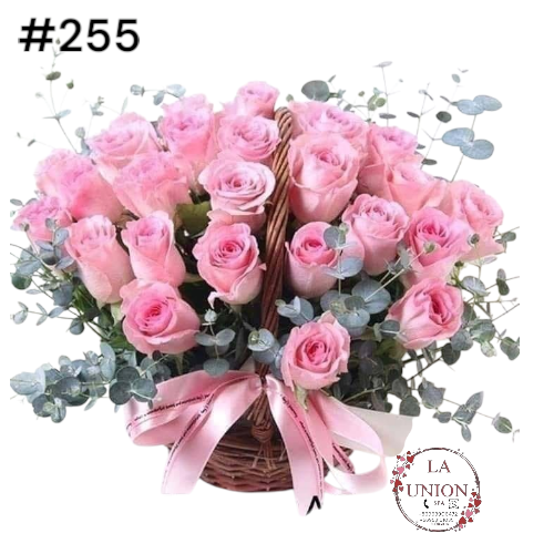 hermoso canasto en rosas  rosadas